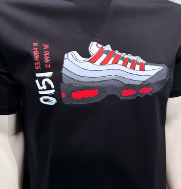 Black t-shirt with a graphic of a sneaker on a mannequin
