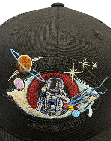 Black cap with space-themed embroidered design featuring an astronaut, planets, and stars.