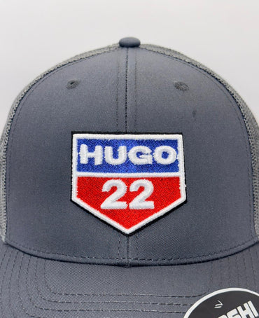 Gray cap with a Hugo 22 logo on a white background