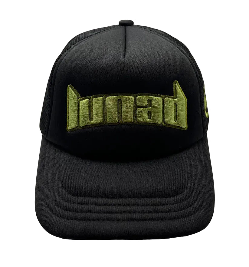 Black cap with green text on a white background