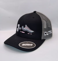 Black and gray cap with multiple brand logos on a white background