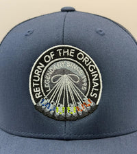 a navy cap with airmax 95 neon mandarin and spark blue trainers
