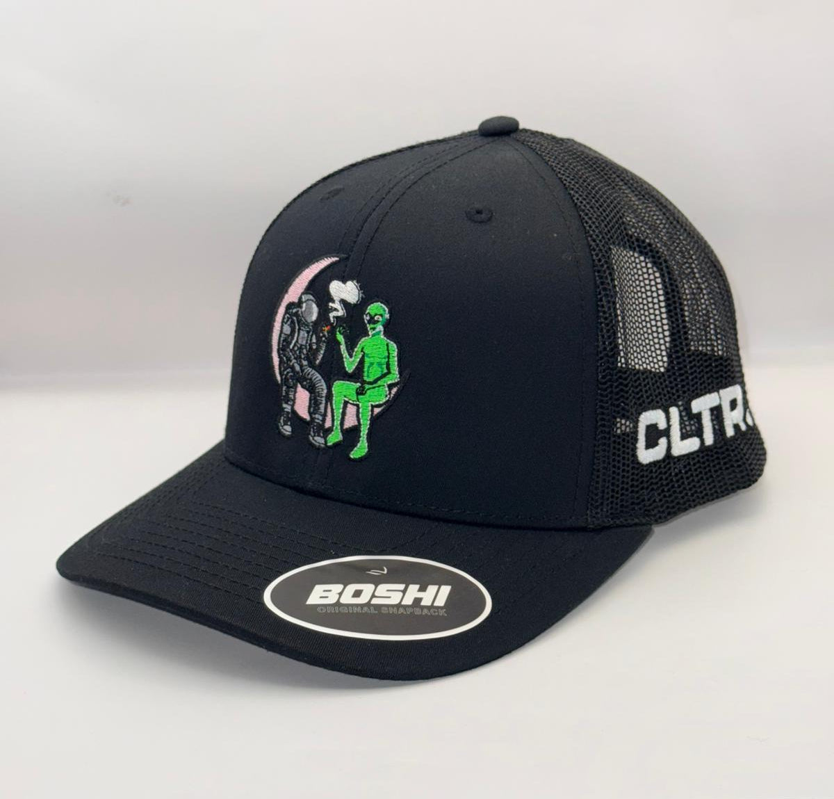 Black cap with green graphic and 'BOSHI' logo on a white background