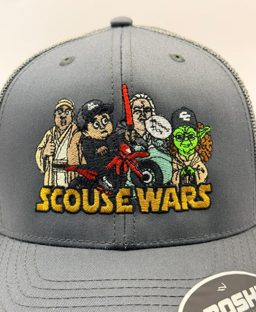Gray cap with 'Scouse Wars' design featuring cartoon characters, on a beige background.