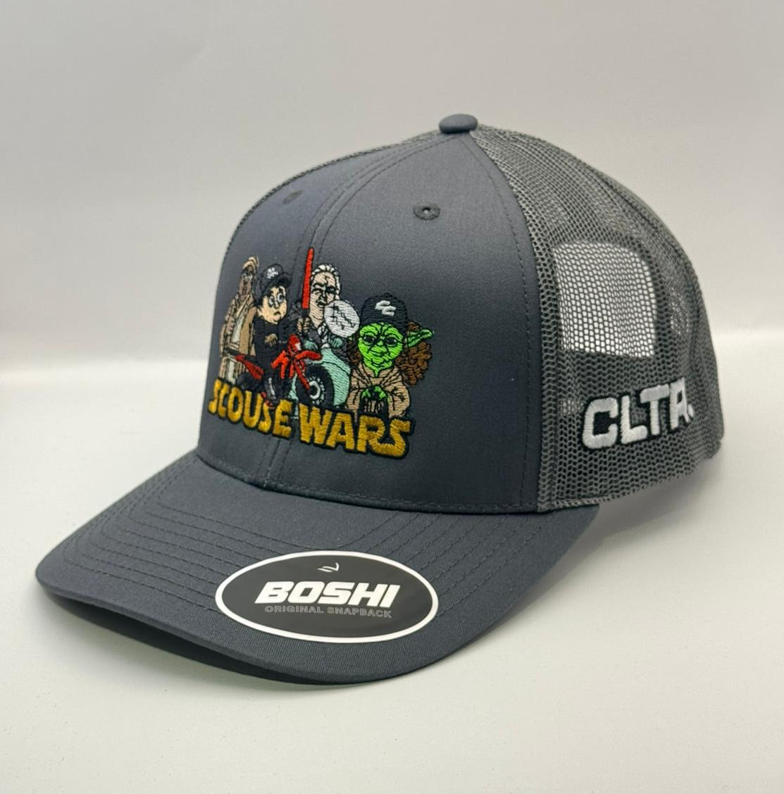 Gray cap with embroidered designs and brand logos on a white background