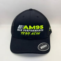 A black trucker-style cap with mesh back panels, featuring 'AM95 MAX PERFORMANCE TEAM NEON' embroidered on the front in neon green and white, with a circular 'BOSHI' sticker on the brim.