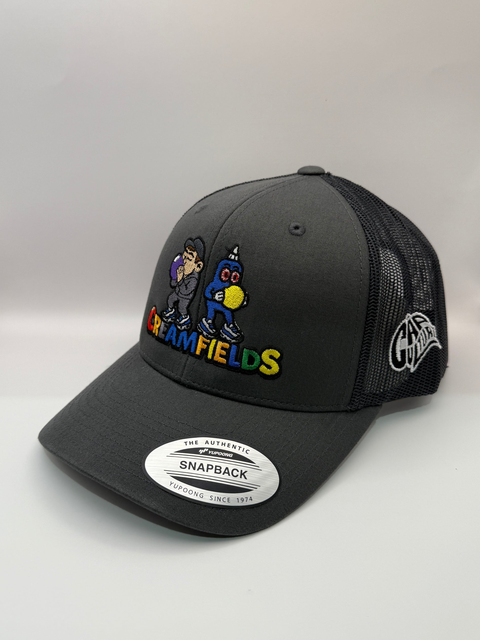 Gray trucker cap with colorful graphics and text on a white background