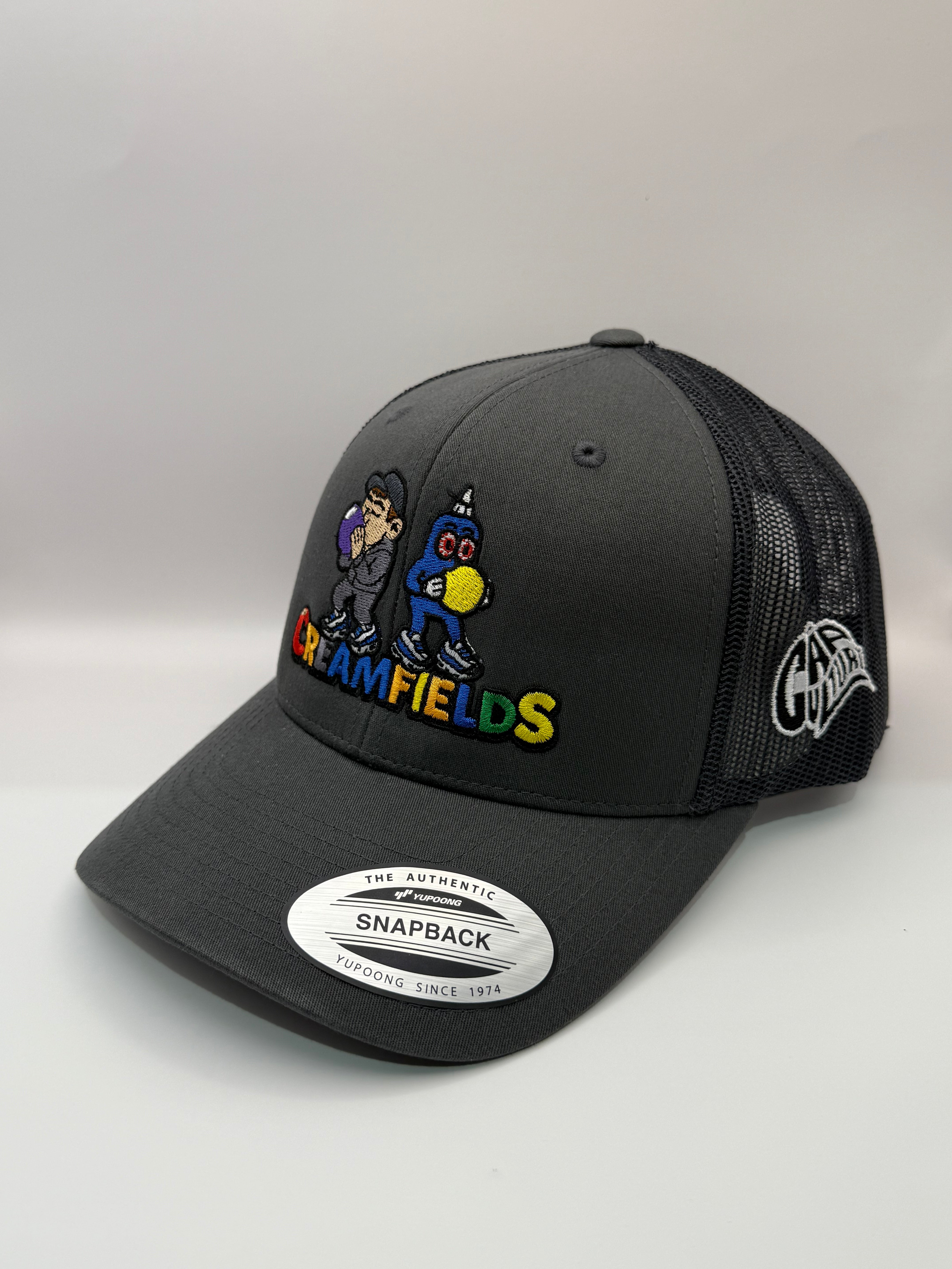 Gray trucker cap with colorful graphics and text on a white background