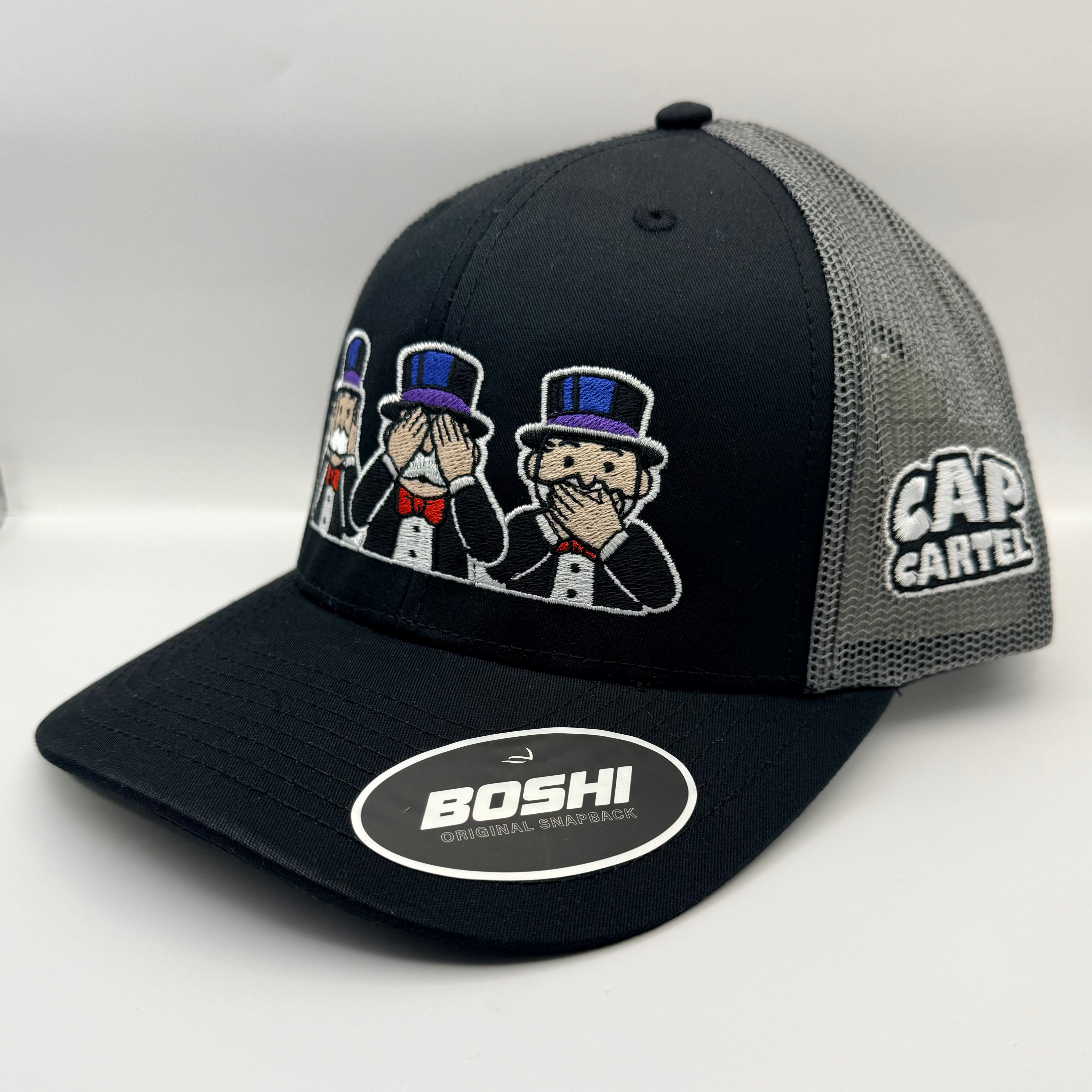Black and gray cap with cartoon characters and 'Boshi' branding on a white background