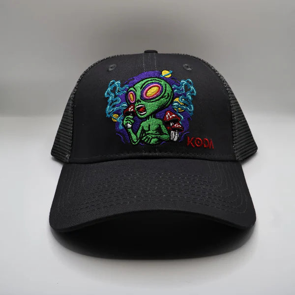 Black cap with alien design and 'KODI' branding on a white background