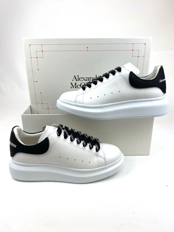 grey and white alexander mcqueen trainers